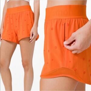 Lululemon Women’s Size 6 Poco Logo Foil Print Orange Hotty Hot 4" Shorts